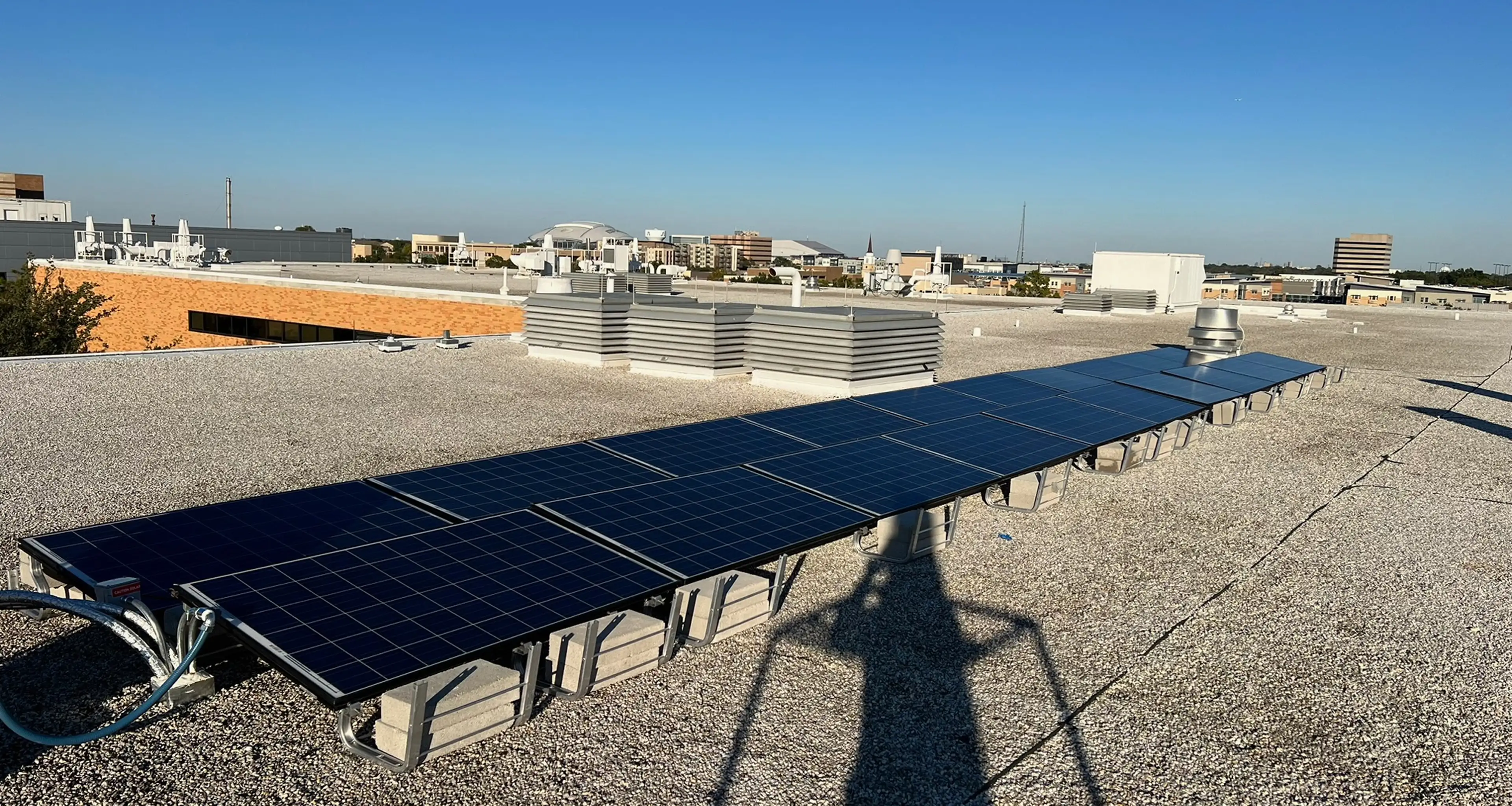Eagle Solar Power crew installing panels on a residential roof